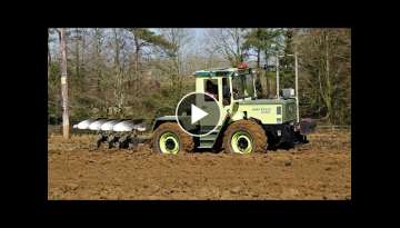 MB Trac 1000 classic tractor ploughing.