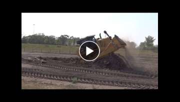 Testing CAT D7E Bulldozer, view from front/side - video 3 of 4