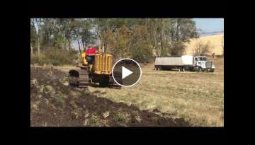 Turbocharged Caterpillar D7 plowing sod