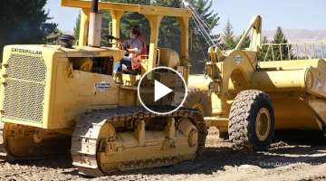 Caterpillar D8H Crawler Tractor Operating with a Cat 463 Towed Scraper in Wanaka