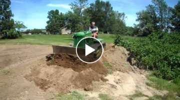 John Deere Model 40 Crawler pushing dirt