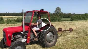 Raking hay with Vicon Acrobat and Massey Ferguson 35.