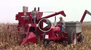 International 303 Combine Unloading on the Go with a Farmall Super M