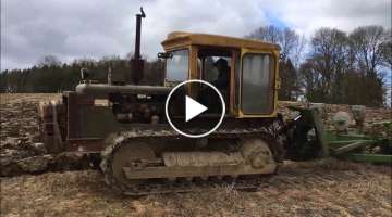 Caterpillar D4D ploughing with a dowdeswell 4 furrow reversible,