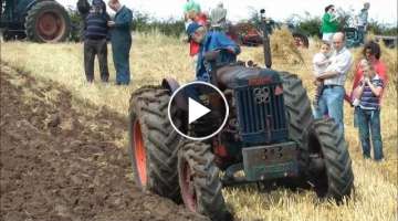 Vintage Fordson 4WD tractor ploughing