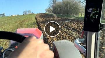 Massey Ferguson 8S.265 ploughing and 6718S discing same field, in cab view